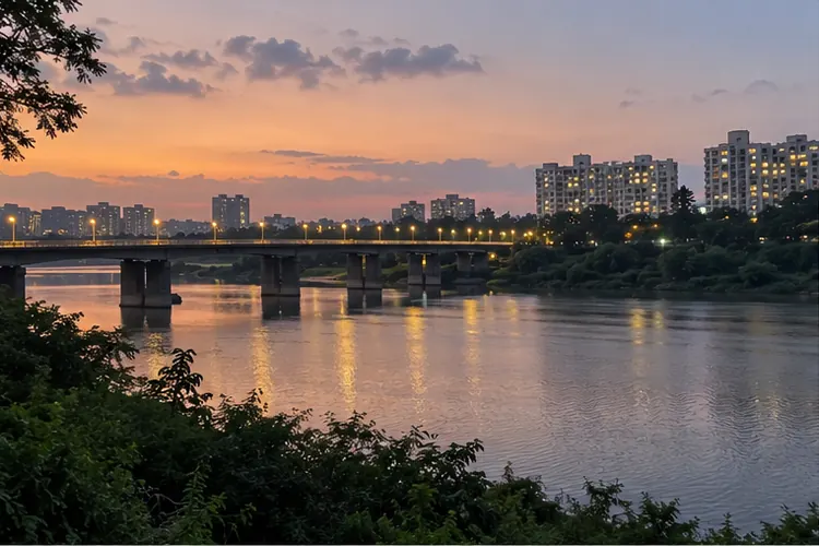 The river at Kalyani Nagar as the bridge lights come on.