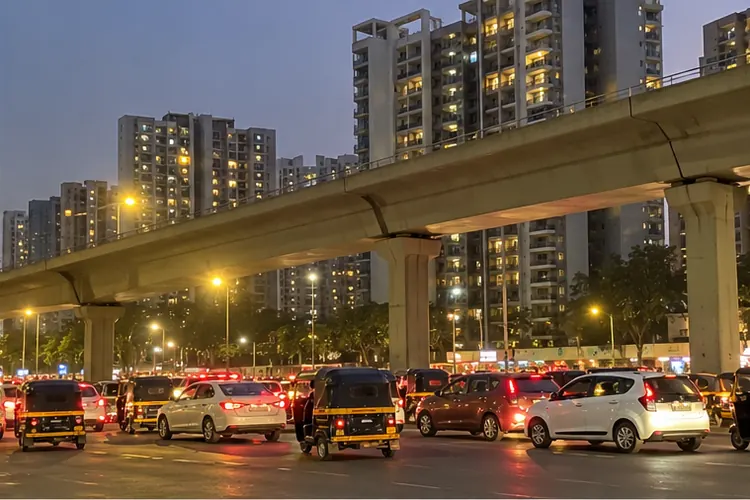 A Wakad chowk under the flyover in the evening.